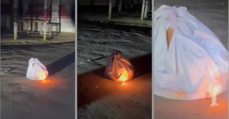 সড়কের মোড়ে কাফনের কাপড়ের পুটলি, পাশে জ্বলছিল মোমবাতি